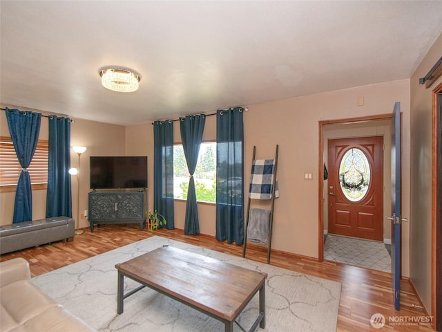 136 W 13th St, Port Angeles, WA 98362 - living area featuring wood finished floors and baseboards