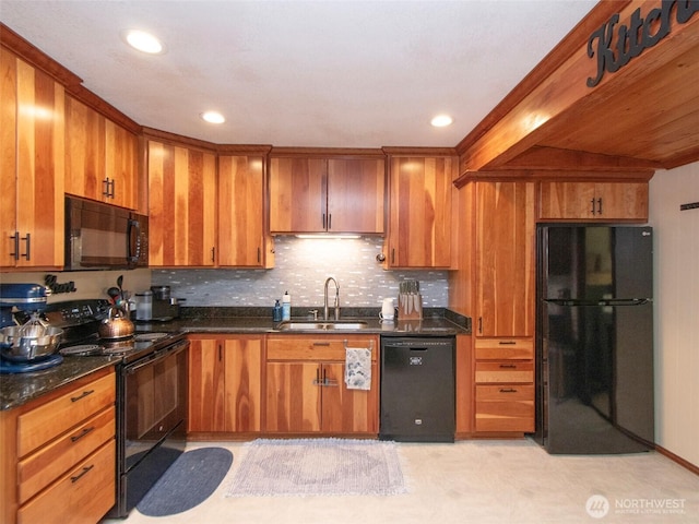 136 W 13th St, Port Angeles, WA 98362 - kitchen with black appliances, brown cabinetry, decorative backsplash, recessed lighting, and dark stone countertops