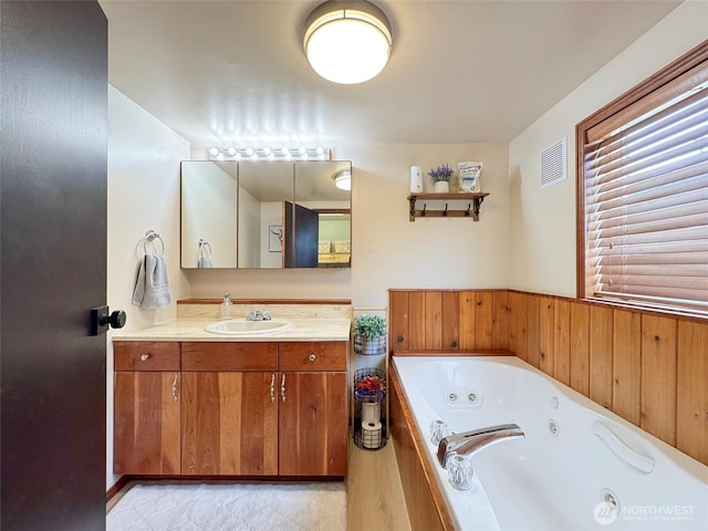 136 W 13th St, Port Angeles, WA 98362 - full bathroom with a whirlpool tub and vanity