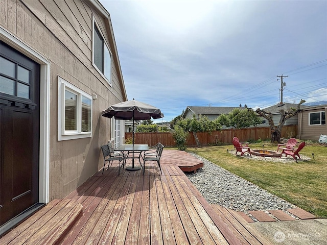 136 W 13th St, Port Angeles, WA 98362 - wooden deck featuring an outdoor fire pit and outdoor dining area