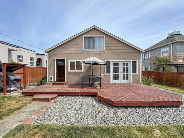 136 W 13th St, Port Angeles, WA 98362 - back of property with french doors and a deck