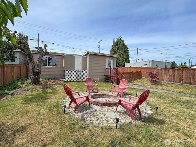 136 W 13th St, Port Angeles, WA 98362 - view of yard featuring a fire pit