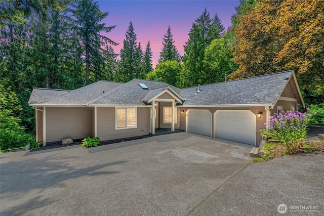 3204 30th St, Bellingham, WA 98225 - ranch-style house featuring a garage, driveway, and roof with shingles