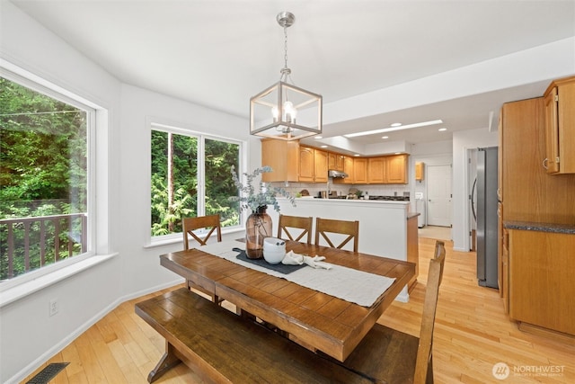 3204 30th St, Bellingham, WA 98225 - dining area featuring a chandelier, healthy amount of natural light, light wood-style floors, and recessed lighting