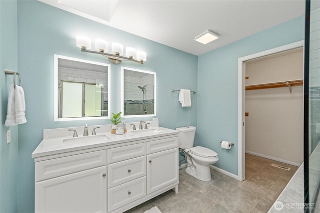 3204 30th St, Bellingham, WA 98225 - full bathroom featuring tiled shower, double vanity, and a spacious closet
