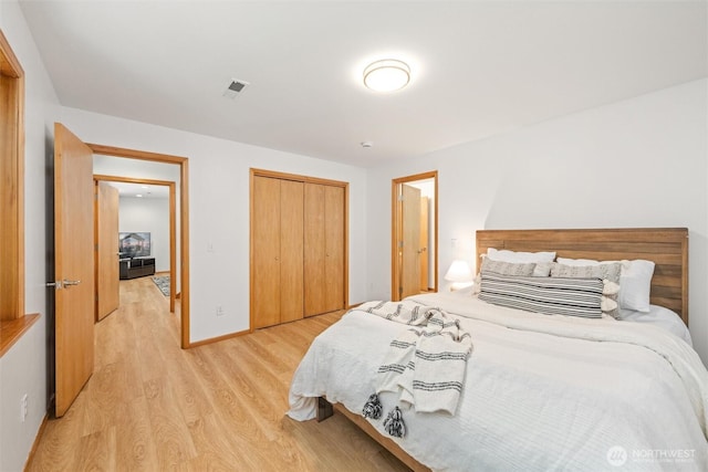 3204 30th St, Bellingham, WA 98225 - bedroom with light wood-style flooring and a closet