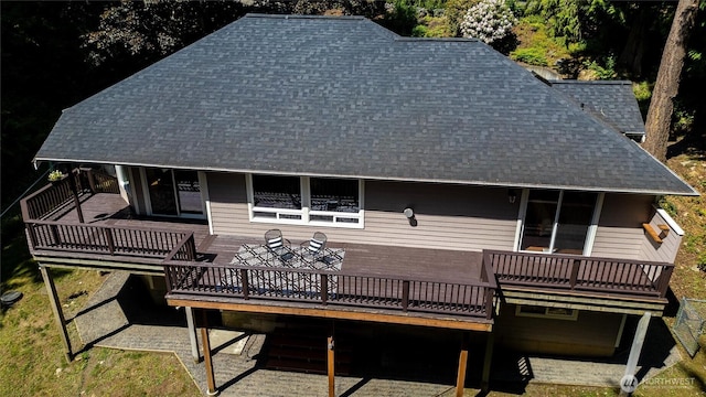 3204 30th St, Bellingham, WA 98225 - rear view of property featuring a shingled roof and a wooden deck