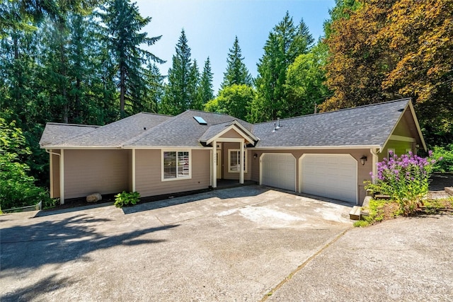 3204 30th St, Bellingham, WA 98225 - ranch-style house with a garage, a shingled roof, and concrete driveway