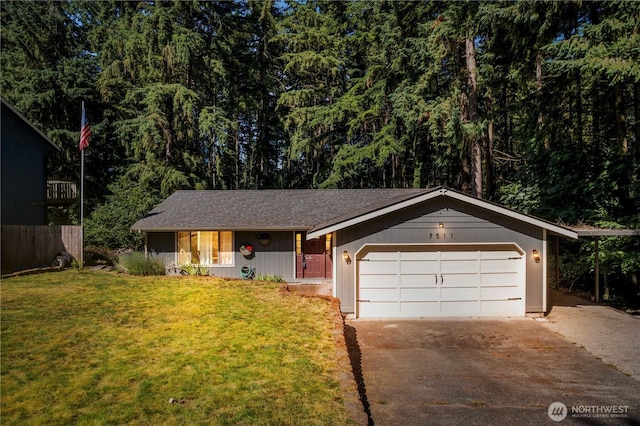 7511 Kittiwake Dr SE, Olympia, WA 98513 - ranch-style home featuring driveway, a garage, and a front lawn