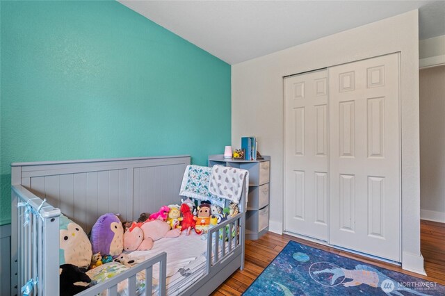 14618 SE 275th Pl, Kent, WA 98042 - bedroom featuring wood finished floors and a closet