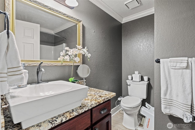 14618 SE 275th Pl, Kent, WA 98042 - bathroom featuring ornamental molding, a textured wall, vanity, wood finished floors, and a shower