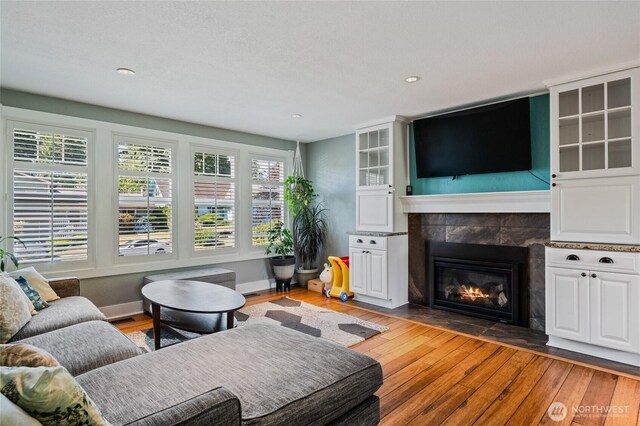 14618 SE 275th Pl, Kent, WA 98042 - living room with a fireplace, light wood finished floors, and recessed lighting