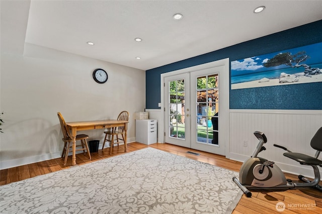 14618 SE 275th Pl, Kent, WA 98042 - exercise area featuring wainscoting, french doors, recessed lighting, and wood finished floors