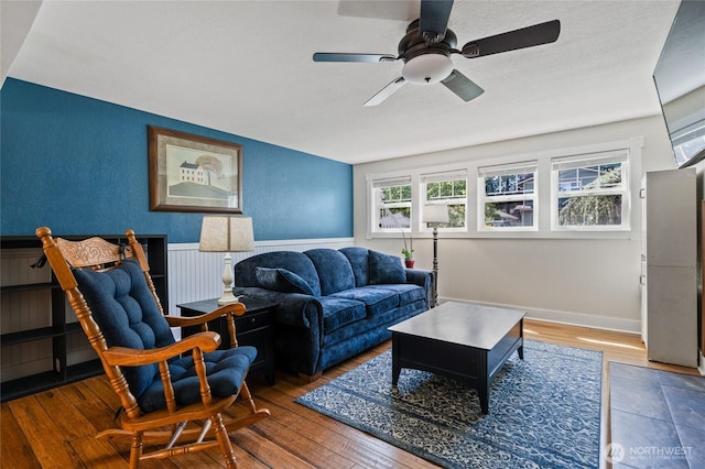 14618 SE 275th Pl, Kent, WA 98042 - living room with ceiling fan, wainscoting, and wood finished floors