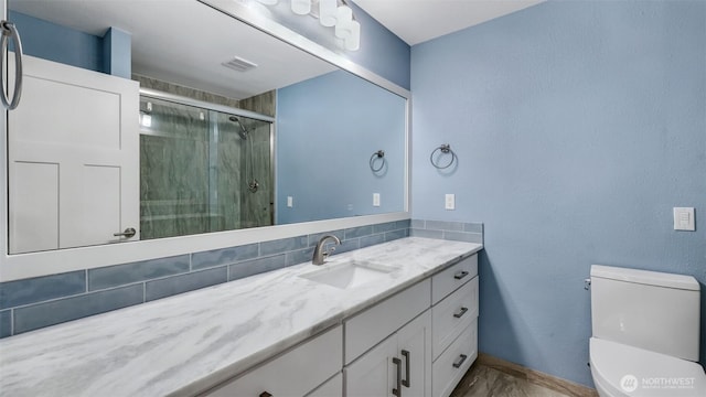 11021 Glen Acres Dr S Unit B, Seattle, WA 98168 - bathroom featuring vanity, a shower stall, and tasteful backsplash