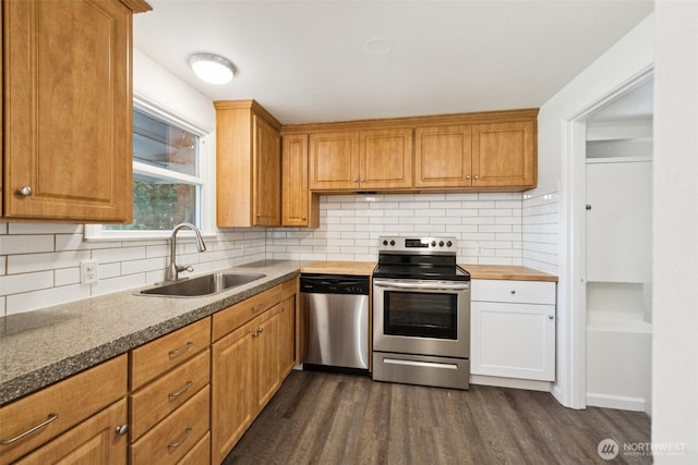 14326 Meridian Ave N, Seattle, WA 98133 - kitchen with stainless steel appliances, dark wood-type flooring, tasteful backsplash, and wooden counters