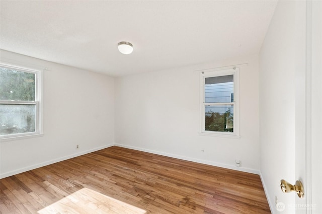 14326 Meridian Ave N, Seattle, WA 98133 - unfurnished room with wood finished floors