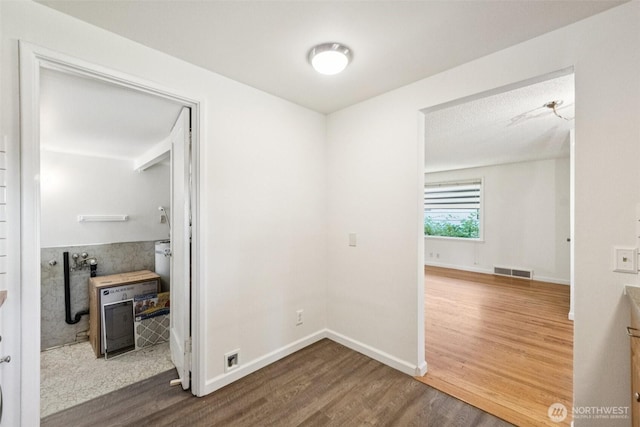 14326 Meridian Ave N, Seattle, WA 98133 - unfurnished room with wood finished floors and baseboards