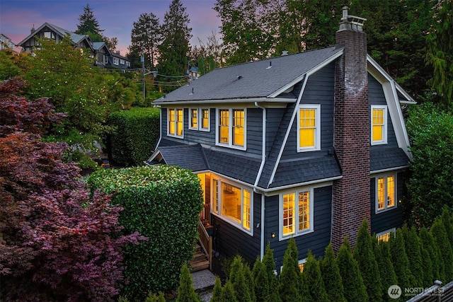 1600 Interlaken Pl E, Seattle, WA 98112 - back of house with a chimney and roof with shingles