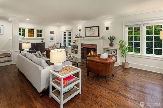 1600 Interlaken Pl E, Seattle, WA 98112 - living room with crown molding, a fireplace, wood finished floors, plenty of natural light, and recessed lighting