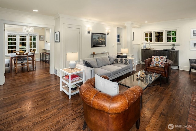 1600 Interlaken Pl E, Seattle, WA 98112 - living area featuring dark wood finished floors, decorative columns, ornamental molding, and recessed lighting