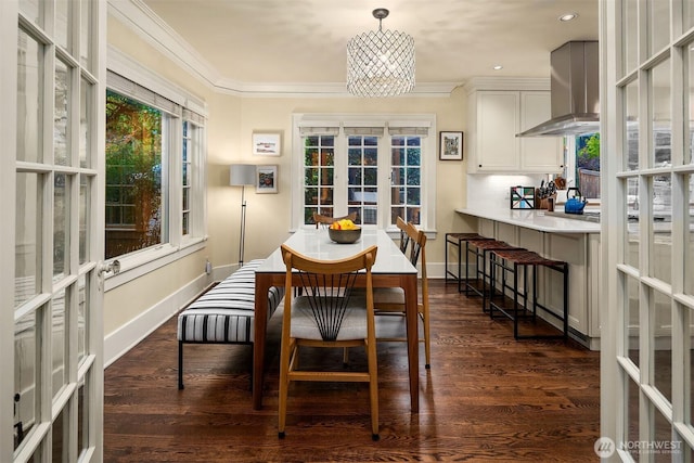 1600 Interlaken Pl E, Seattle, WA 98112 - dining room featuring french doors, crown molding, dark wood-type flooring, and recessed lighting