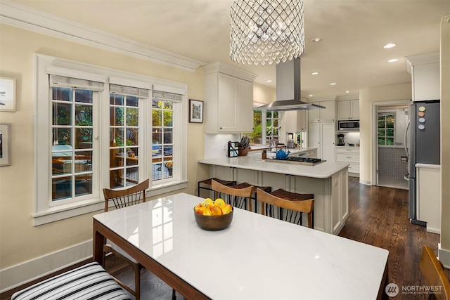 1600 Interlaken Pl E, Seattle, WA 98112 - dining area with dark wood-style flooring, crown molding, a chandelier, and recessed lighting