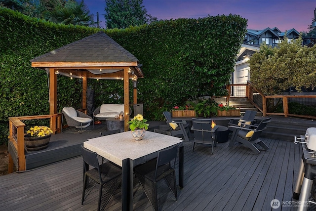 1600 Interlaken Pl E, Seattle, WA 98112 - wooden terrace featuring a gazebo, outdoor dining space, and an outdoor fire pit