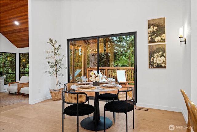 9320 Hoeder Ln, Bothell, WA 98011 - dining space featuring light wood-type flooring and high vaulted ceiling