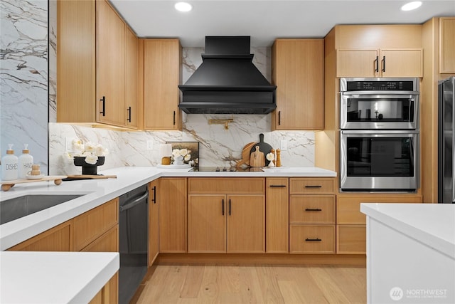 9320 Hoeder Ln, Bothell, WA 98011 - kitchen featuring custom range hood, appliances with stainless steel finishes, light countertops, light wood-style floors, and recessed lighting