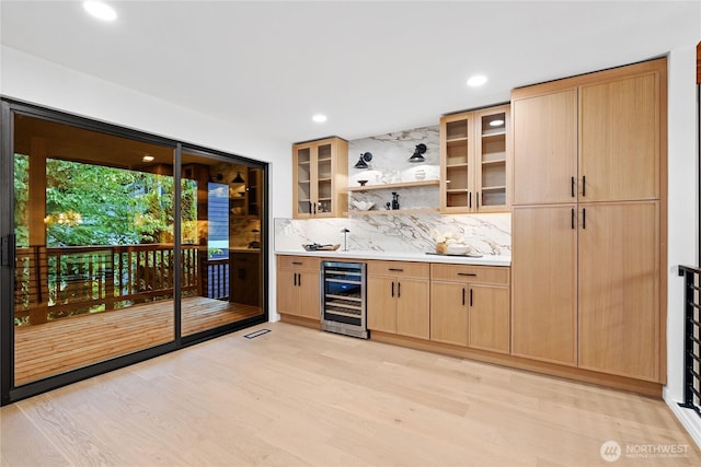 9320 Hoeder Ln, Bothell, WA 98011 - indoor wet bar featuring wine cooler, decorative backsplash, light wood finished floors, and recessed lighting