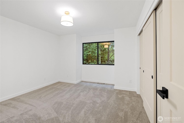 9320 Hoeder Ln, Bothell, WA 98011 - unfurnished bedroom featuring carpet flooring and a closet
