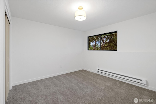9320 Hoeder Ln, Bothell, WA 98011 - unfurnished bedroom with a baseboard radiator, carpet, and a closet