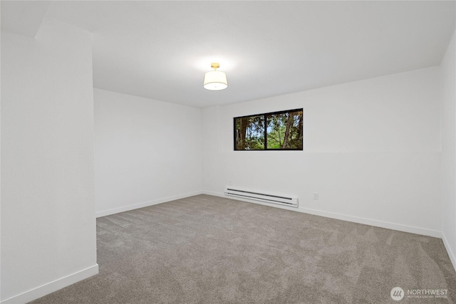 9320 Hoeder Ln, Bothell, WA 98011 - carpeted spare room featuring a baseboard radiator and baseboards