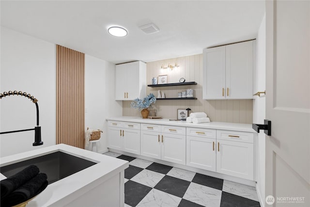 9320 Hoeder Ln, Bothell, WA 98011 - kitchen featuring open shelves, white cabinetry, and light countertops