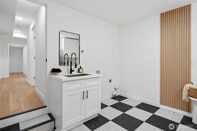 9320 Hoeder Ln, Bothell, WA 98011 - laundry area with electric dryer hookup, washer hookup, cabinet space, and recessed lighting