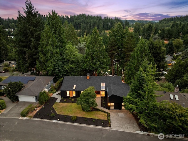 9320 Hoeder Ln, Bothell, WA 98011 - aerial view of property and surrounding area featuring a heavily wooded area