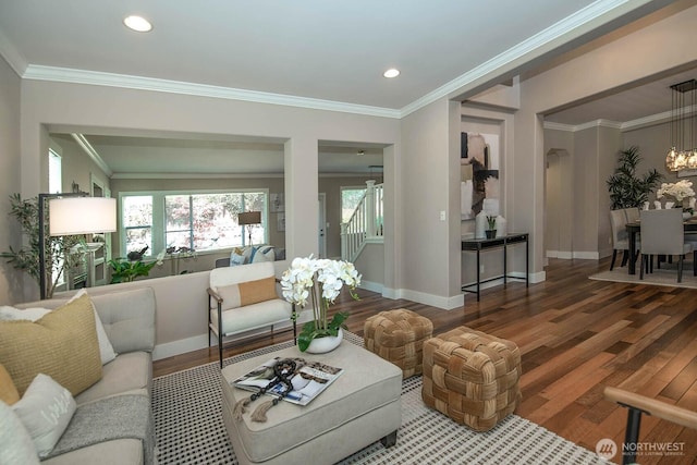 12530 68th Ave SE, Snohomish, WA 98296 - living area with wood finished floors, stairway, ornamental molding, recessed lighting, and a chandelier