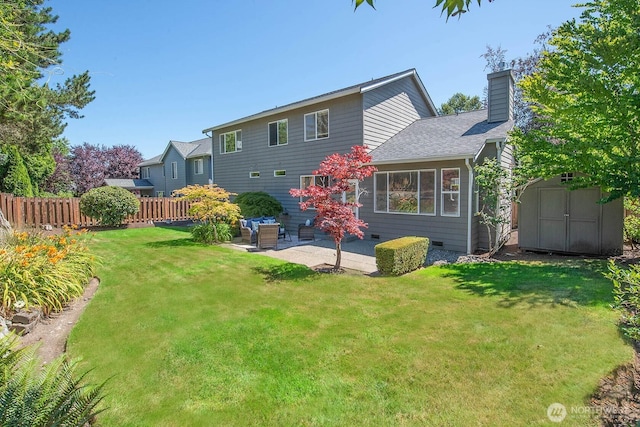 12530 68th Ave SE, Snohomish, WA 98296 - rear view of house with a patio area, a chimney, a shed, and a shingled roof