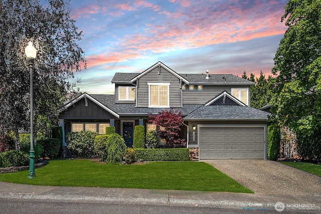 12530 68th Ave SE, Snohomish, WA 98296 - view of front of house featuring roof with shingles, an attached garage, concrete driveway, and a front yard