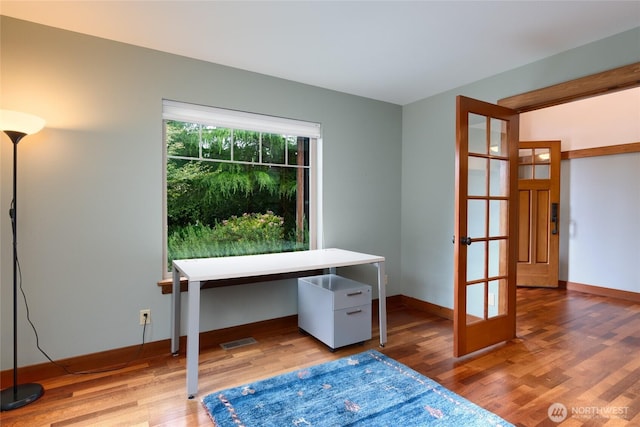 14450 Austin Pl, Anacortes, WA 98221 - unfurnished office featuring wood finished floors and french doors