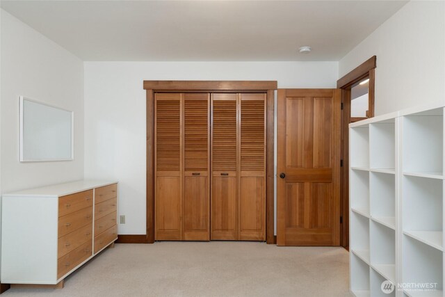 14450 Austin Pl, Anacortes, WA 98221 - unfurnished bedroom with light colored carpet and a closet