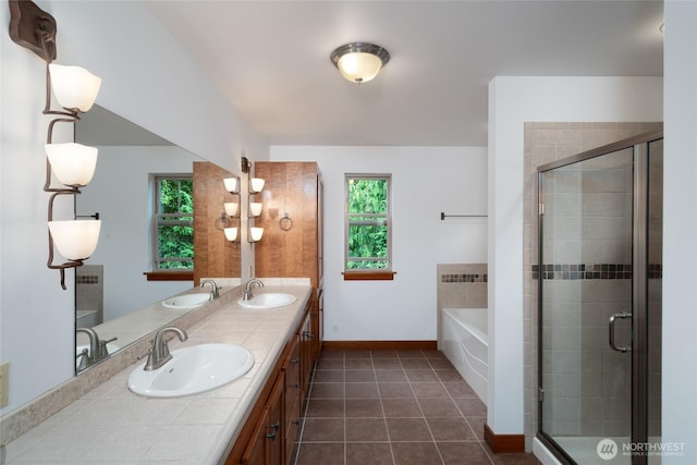 14450 Austin Pl, Anacortes, WA 98221 - bathroom with a garden tub, tile patterned floors, a shower stall, and double vanity