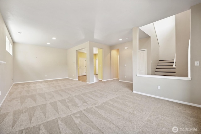5723 66th Ave SE, Lacey, WA 98513 - empty room with light colored carpet, stairs, and recessed lighting
