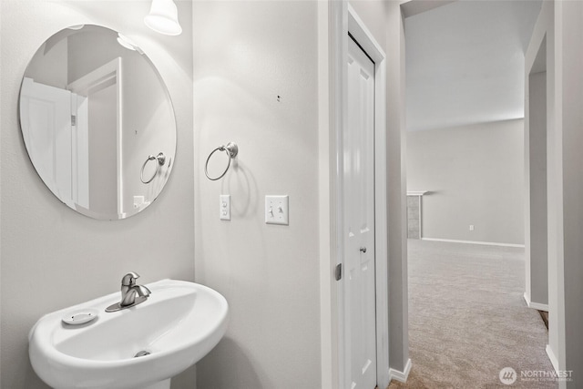 5723 66th Ave SE, Lacey, WA 98513 - bathroom with a sink and baseboards