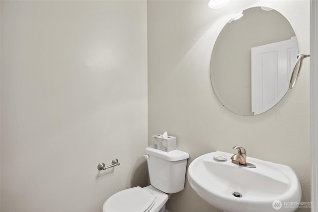 5723 66th Ave SE, Lacey, WA 98513 - half bathroom with a sink and toilet