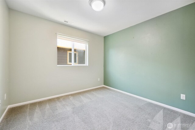 5723 66th Ave SE, Lacey, WA 98513 - empty room featuring carpet and baseboards