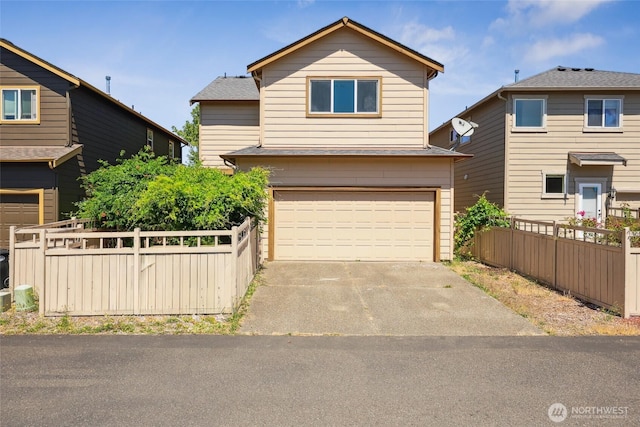 5723 66th Ave SE, Lacey, WA 98513 - traditional-style home featuring an attached garage and driveway