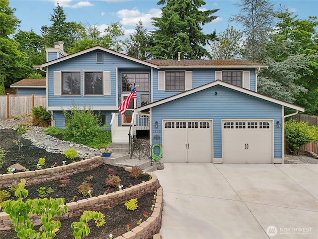 1435 S 263rd Pl, Des Moines, WA 98198 - split foyer home featuring driveway and an attached garage
