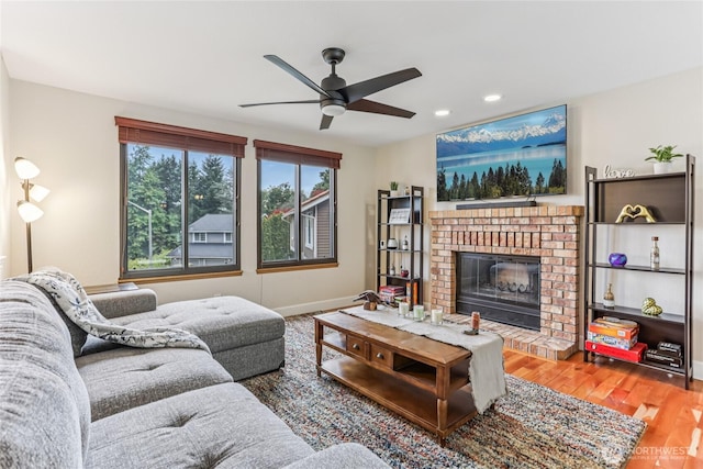 1435 S 263rd Pl, Des Moines, WA 98198 - living room with ceiling fan, recessed lighting, wood finished floors, and a brick fireplace